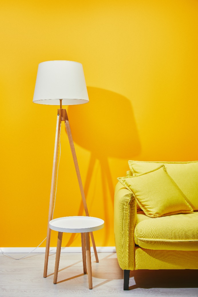 Yellow walls and floor lamp